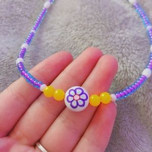 Brandy Melville Jewelry - purple flower charm necklace Brandy Melville Jewelry - purple flower charm necklace